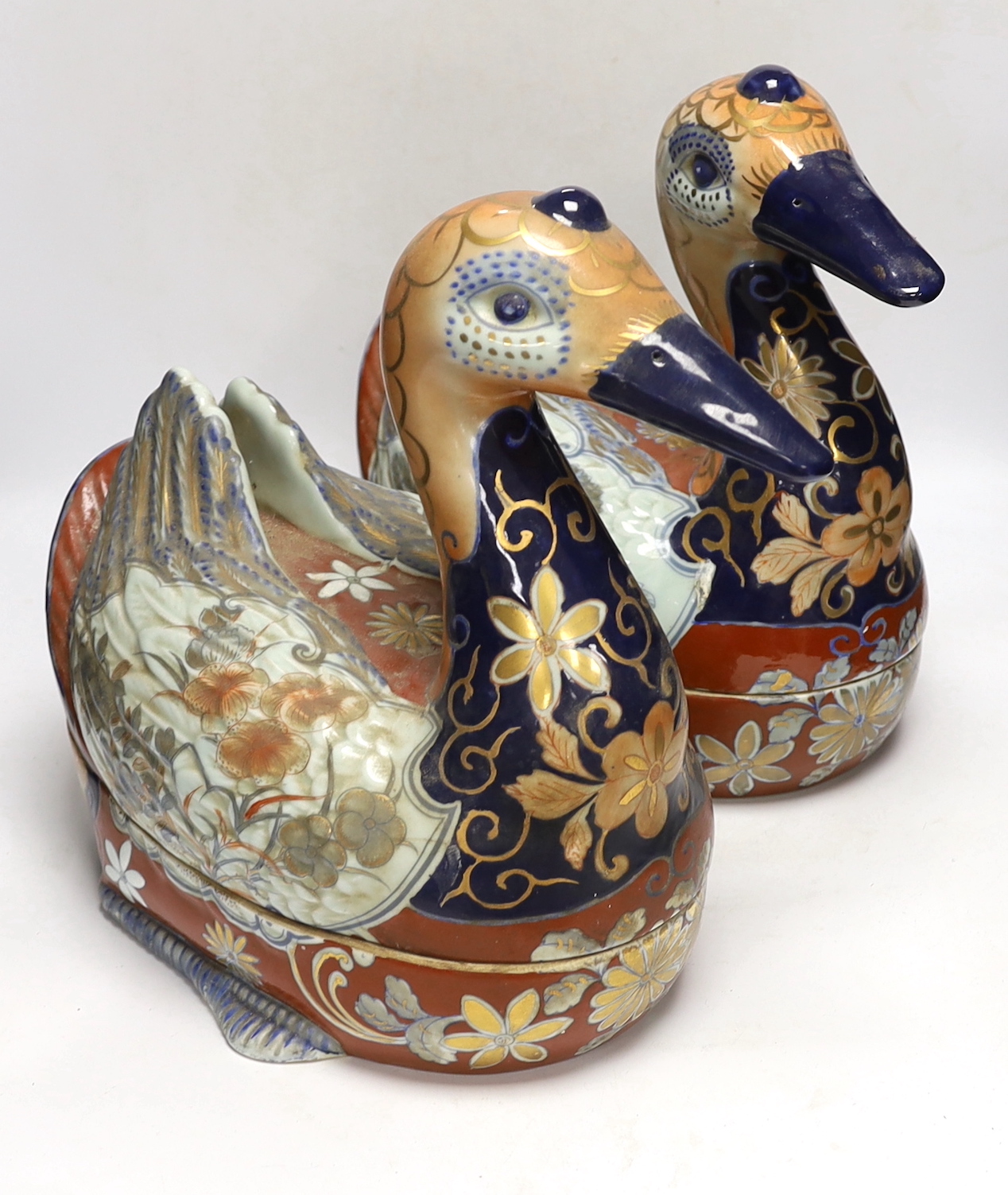 Two Imari style duck tureens and covers, 34cm high